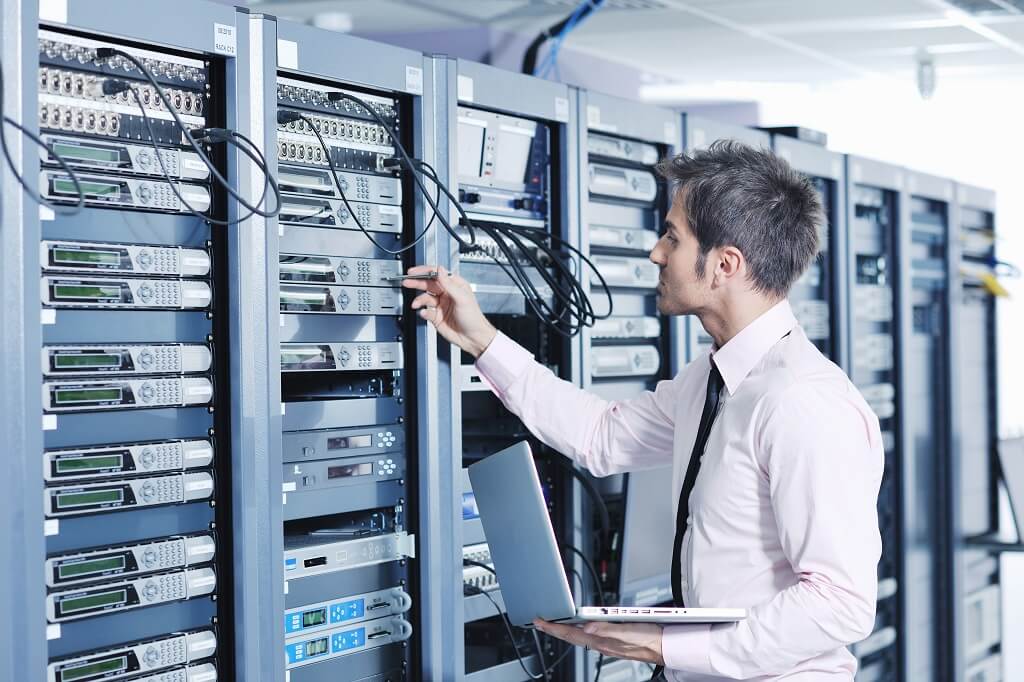 male working on servers